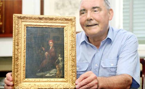 Wide Bay and Burnett Society assistant Edward Mosig with the painting thought to be a William Hogarth. Wide Bay and Burnett Society assistant Edward Mosig with the painting thought to be a William Hogarth.
